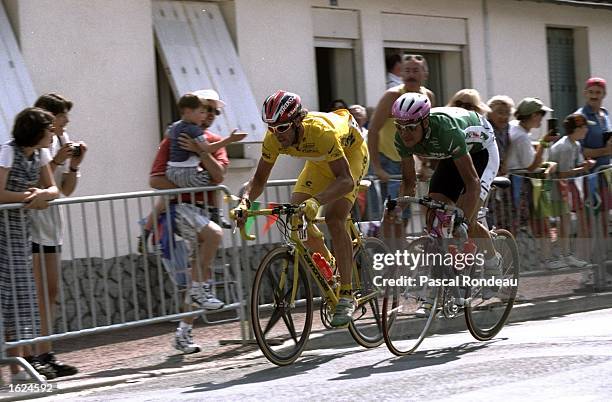 Mario Cipollini of Italy and team Saeco leads Erik Zabel of Germany and team Telekom in a sprint during stage 4 of the 84th Tour de France from...