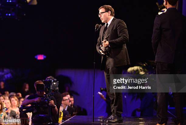 Director David O. Russell poses in the Kindle Fire HD and IMDb Green Room during the 2013 Film Independent Spirit Awards at Santa Monica Beach on...