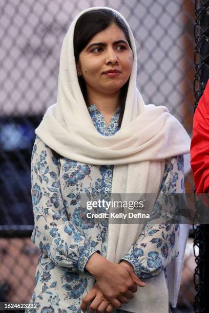 Nobel Peace Prize winner Malala Yousafzai speaks and meets with members of the Afghan Women's Team at Ultra Football on August 19, 2023 in Melbourne,...