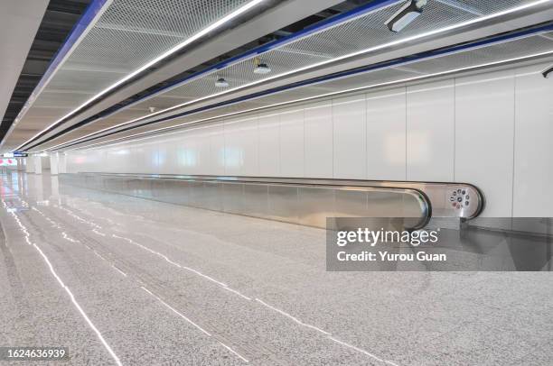 marble floor towards to the elevator in subway,guangzhou subway station. - metal catwalk stock pictures, royalty-free photos & images