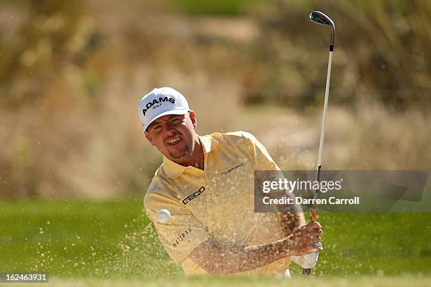 Robert Garrigus hits his fifth shot on the 11th hole during the quarterfinal round of the World Golf Championships - Accenture Match Play at the Golf...