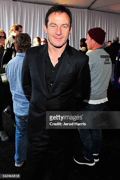Actor Jason Isaacs poses in the Kindle Fire HD and IMDb Green Room during the 2013 Film Independent Spirit Awards at Santa Monica Beach on February...