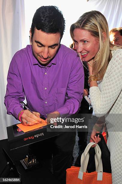 Jonathan Gordon, left, poses in the Kindle Fire HD and IMDb Green Room during the 2013 Film Independent Spirit Awards at Santa Monica Beach on...