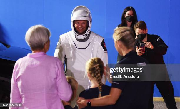 Crew-7 member European Space Agency astronaut Andreas Mogensen greets family members after walking out of the Neil A. Armstrong Operations and...