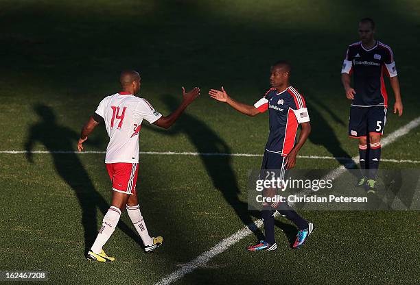 Jose Goncalves of the New England Revolution greets Thierry Henry of the New York Red Bulls following the FC Tucson Desert Diamond Cup Consolation...