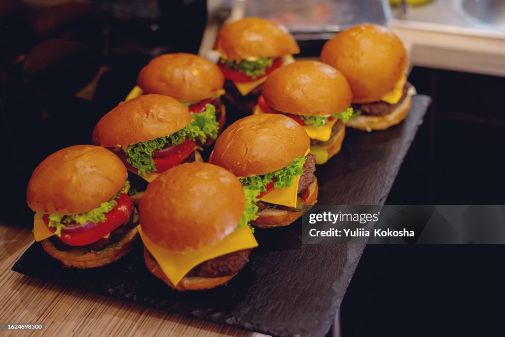 Close-up of burgers on table
