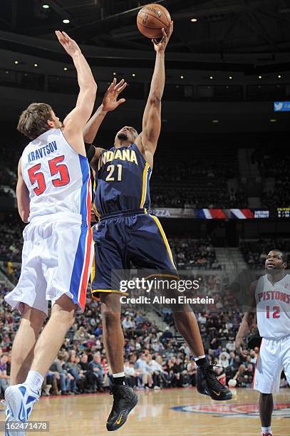 David West of the Indiana Pacers shoots against Viacheslav Kravtsov of the Detroit Pistons on February 23, 2013 at The Palace of Auburn Hills in...