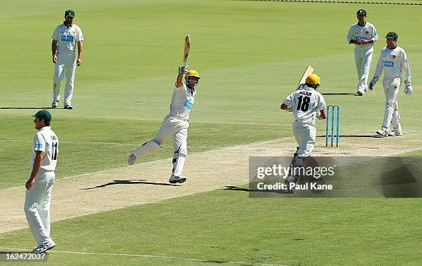 Burt Cockley and Ashton Agar of the Warriors celebrate hitting the winning runs during day four of the Sheffield Shield match between the Western...