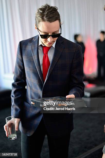 Producer Tanner King Barklow poses in the Kindle Fire HD and IMDb Green Room during the 2013 Film Independent Spirit Awards at Santa Monica Beach on...