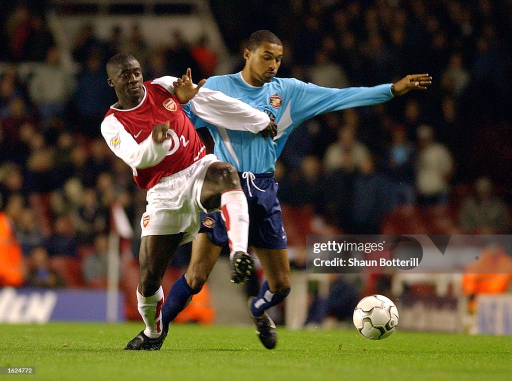 Kolo Toure of Arsenal and Matt Piper of Sunderland