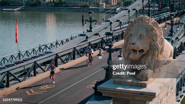 In an aerial view, athletes compete in the women's marathon final at the Chain Bridge during day eight of the World Athletics Championships Budapest...