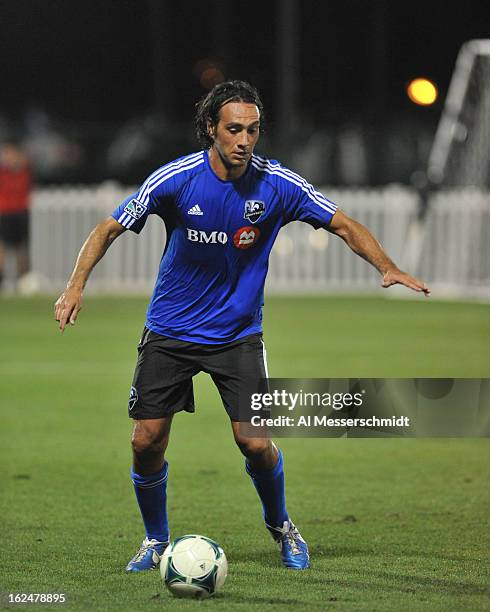 Defender Alessandro Nesta of the Montreal Impact runs upfield against the Columbus Crew in the final round of the Disney Pro Soccer Classic on...