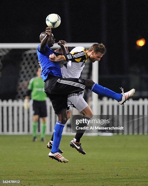 Defender Hassoun Camara of the Montreal Impact battles midfielde Eddie Gavin of the Columbus Crew in the final round of the Disney Pro Soccer Classic...