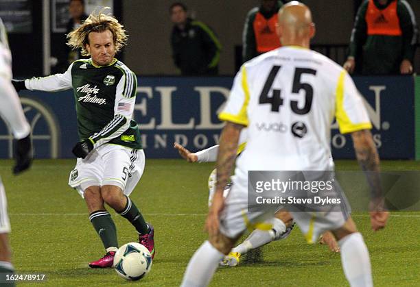 Michael Harrington of the Portland Timbers scores a goal past Daniel Majstorovic of AIK during the second half of the game at Jeld-Wen Field on...