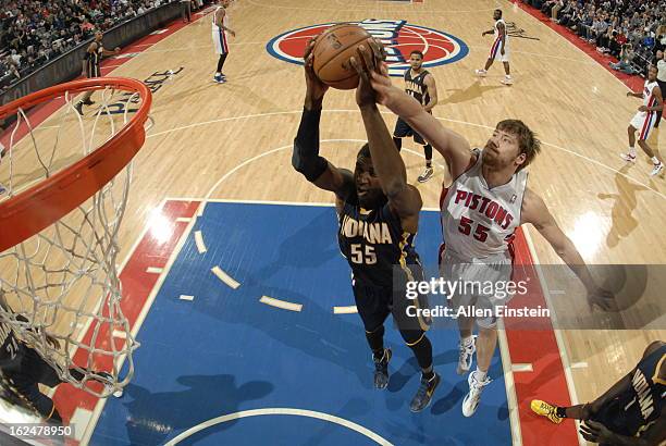 Roy Hibbert of the Indiana Pacers pulls down a rebound against Viacheslav Kravtsov of the Detroit Pistons on February 23, 2013 at The Palace of...