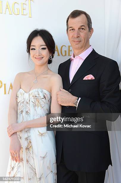 Actress Lemon Zhang and CEO of Piaget Philippe Leopold-Metzger pose in the Piaget Lounge during The 2013 Film Independent Spirit Awards on February...