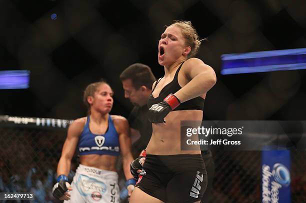 Ronda Rousey celebrates her UFC Bantamweight Title over Liz Carmouche at Honda Center on February 23, 2013 in Anaheim, California.