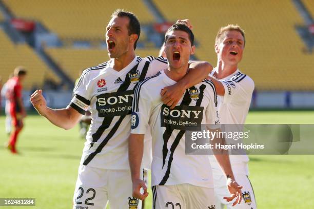 Corey Gameiro of the Phoenix celebrates his goal with teammates Andrew Durante and Ben Sigmund during the round 22 A-League match between the...