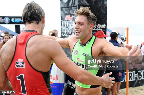 Kendrick Louis congratulates Alastair Day after the Noosa Heads round of the 2012-13 Kelloggs Nutri-Grain Ironman Series on February 24, 2013 in...