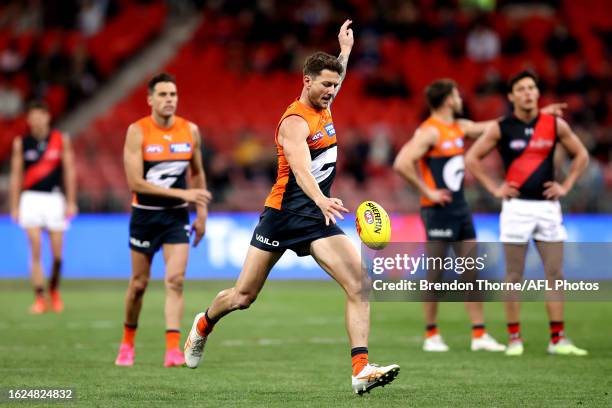 Daniel Lloyd of the Giants kicks for goal during the round 23 AFL match between Greater Western Sydney Giants and Essendon Bombers at GIANTS Stadium,...