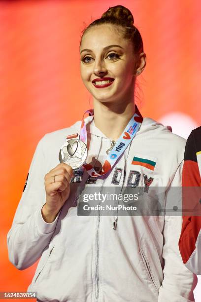 Silver medalist Boryana Kaleyn of Bulgaria poses with her medal during the Individual Ribbon Final during the 40th FIG Rhythmic Gymnastics World...