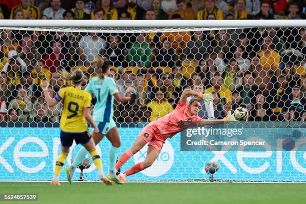 Mackenzie Arnold of Australia dives in vain as Kosovare Asllani of Sweden scores her team's second goal during the FIFA Women's World Cup Australia &...