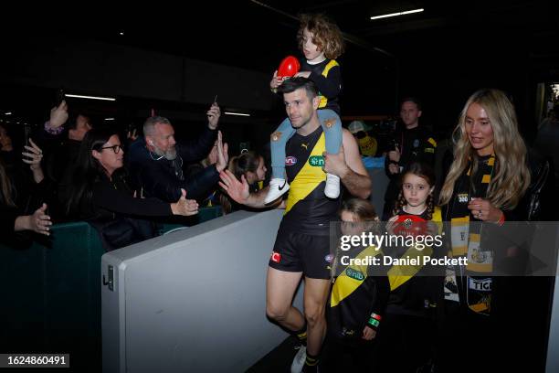 Trent Cotchin of the Tigers leaves the field after playing his final game during the round 23 AFL match between Richmond Tigers and North Melbourne...