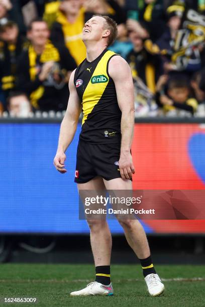 Jack Riewoldt of the Tigers reacts after missing a goal during the round 23 AFL match between Richmond Tigers and North Melbourne Kangaroos at...
