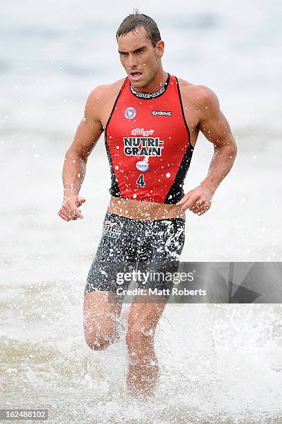 Matt Poole runs out of the water during the Noosa Heads round of the 2012-13 Kelloggs Nutri-Grain Ironman Series on February 24, 2013 in Noosa,...