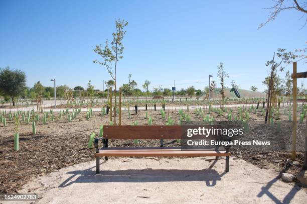 Bench in the semi-forest park in San Blas-Canillejas, in the neighborhood of Las Rosas, on 19 August, 2023 in Madrid, Spain. The Urbanism,...