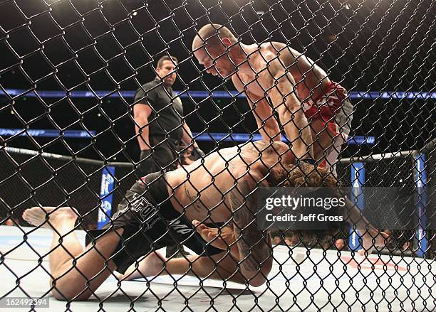 Anton Kuivanen of Finland and Michael Chiesa fight following their UFC Lightweight bout at Honda Center on February 23, 2013 in Anaheim, California.