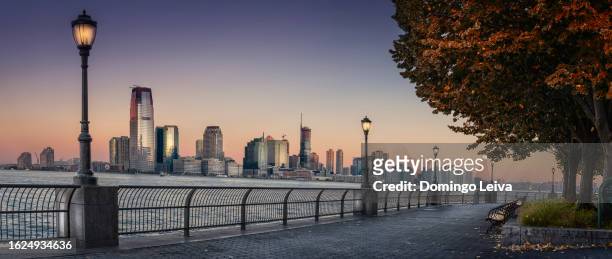jersey city from south cove park - south park stock pictures, royalty-free photos & images