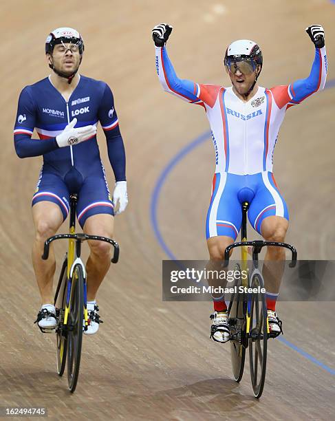 Denis Dmitriev of Russia celebrates his semi-final victory over Francois Pervis of France in the men's sprint on day five of the 2013 UCI Track World...