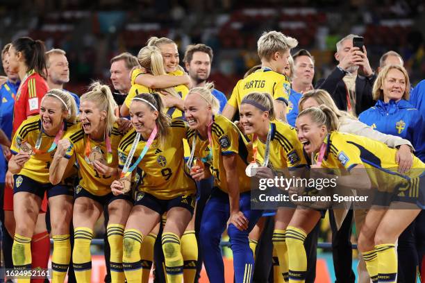 Sweden players celebrate with their third place medals following their sides victory in the FIFA Women's World Cup Australia & New Zealand 2023 Third...