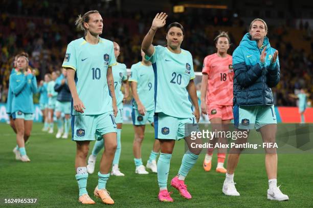 Emily Van-Egmond, Sam Kerr and Alanna Kennedy of Australia applaud fans after the team's defeat in the FIFA Women's World Cup Australia & New Zealand...