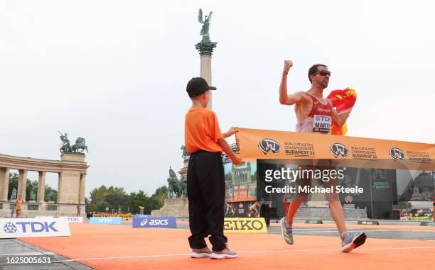 Alvaro Martin of Team Spain celebrates as he crosses the finishing line to win the Men's 20km Race Walk Final during day one of the World Athletics...