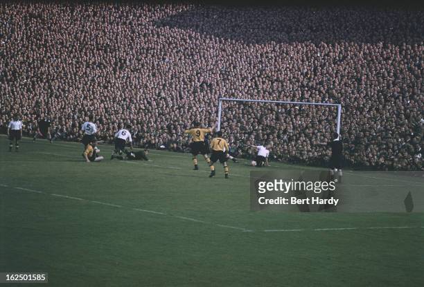 Wolverhampton Wanderers score the only goal of the match to beat Blackpool at Molineux Stadium, Wolverhampton, 4th September 1954. Wolves won the...