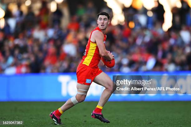 Sam Flanders of the Suns in action during the round 23 AFL match between Gold Coast Suns and Carlton Blues at Heritage Bank Stadium, on August 19 in...