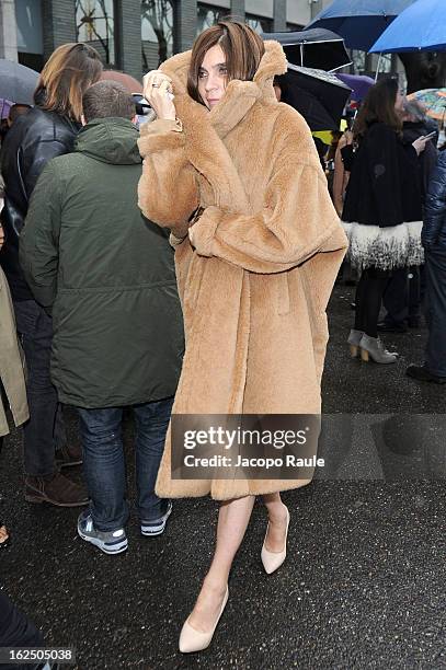 Carine Roitfeld attends the Emporio Armani fashion show as part of Milan Fashion Week Womenswear Fall/Winter 2013/14 on February 24, 2014 in Milan,...