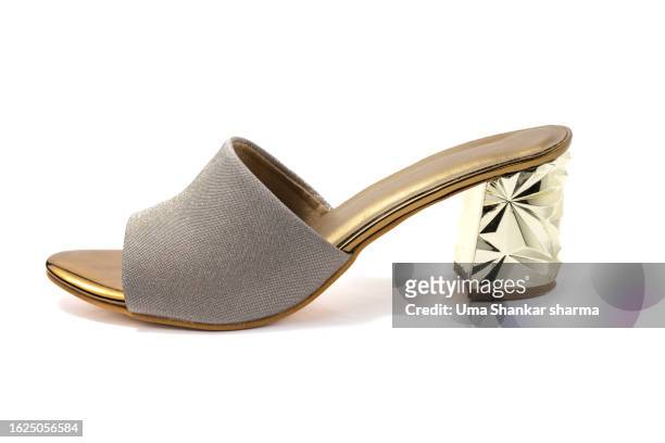 golden high heels - gold shoe stock pictures, royalty-free photos & images