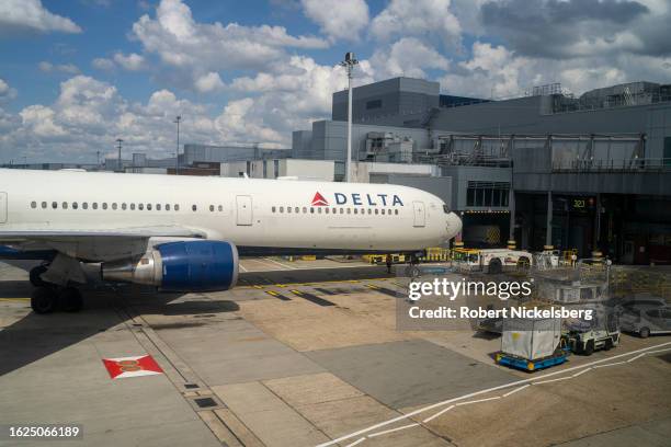 Delta Airlines passenger plane prepares to depart from its gate August 16, 2023 at the Heathrow International Airport in Hounslow, United Kingdom.