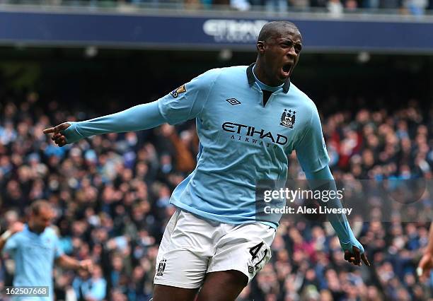 Yaya Toure of Manchester City celebrates after scoring the opening goal during the Barclays Premier League match between Manchester City and Chelsea...