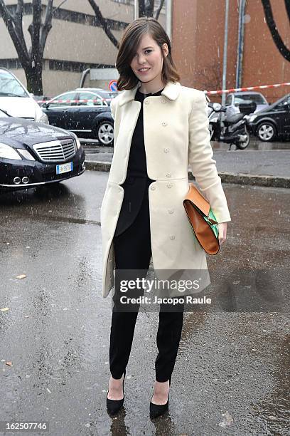 Lou Lesage attends the Emporio Armani fashion show as part of Milan Fashion Week Womenswear Fall/Winter 2013/14 on February 24, 2014 in Milan, Italy.