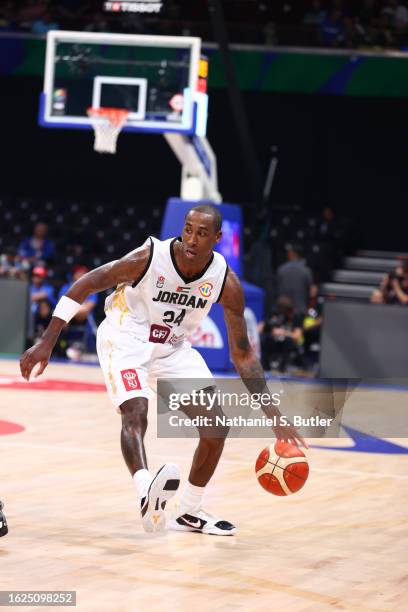 Rondae Hollis-Jefferson of Jordan drives against Greece as part of the 2023 FIBA World Cup on August 26, 2023 at Mall of Asia Arena in Manila,...