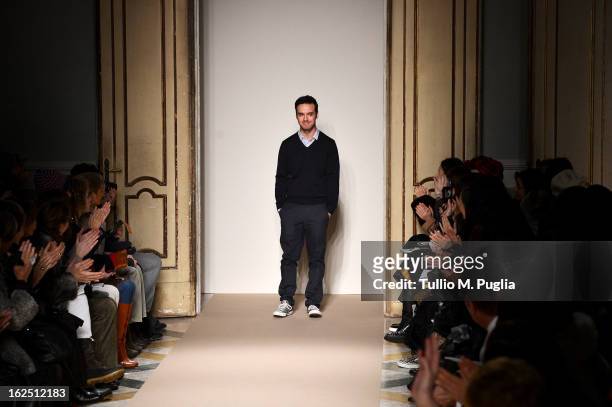 Designer Gabriele Colangelo acknowledges the audience at the end of the Genny fashion show as part of Milan Fashion Week Womenswear Fall/Winter...