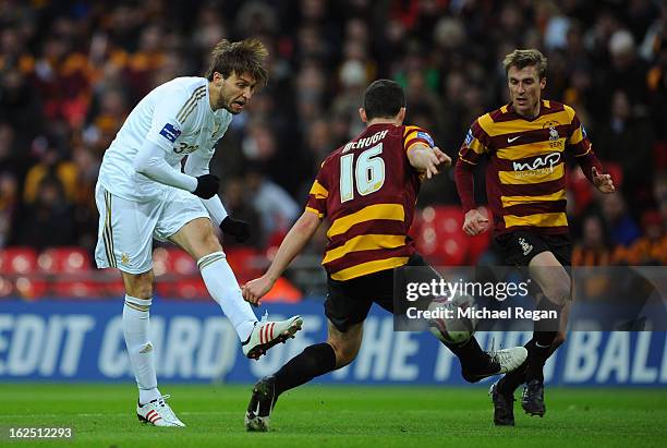 Michu of Swansea City scores their second goal during the Capital One Cup Final match between Bradford City and Swansea City at Wembley Stadium on...