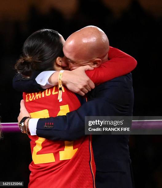 Spain's midfielder Claudia Zornoza is congratuled by President of the Royal Spanish Football Federation Luis Rubiales after winning the Australia and...
