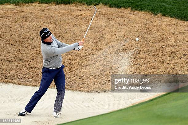 Hunter Mahan hits his third shot on the second hole during the semifinal round of the World Golf Championships - Accenture Match Play at the Golf...