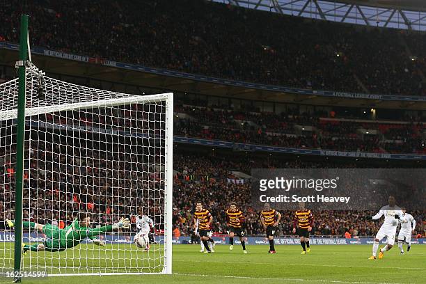 Jonathan de Guzman of Swansea City scores their fourth goal from the penalty spot during the Capital One Cup Final match between Bradford City and...