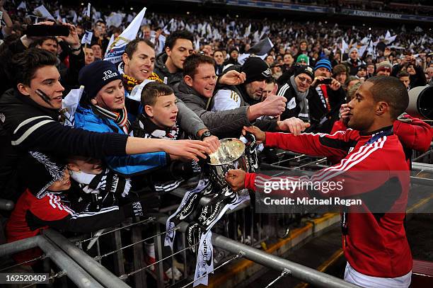 Wayne Routledge of Swansea City shows the cup to the fans during the Capital One Cup Final match between Bradford City and Swansea City at Wembley...